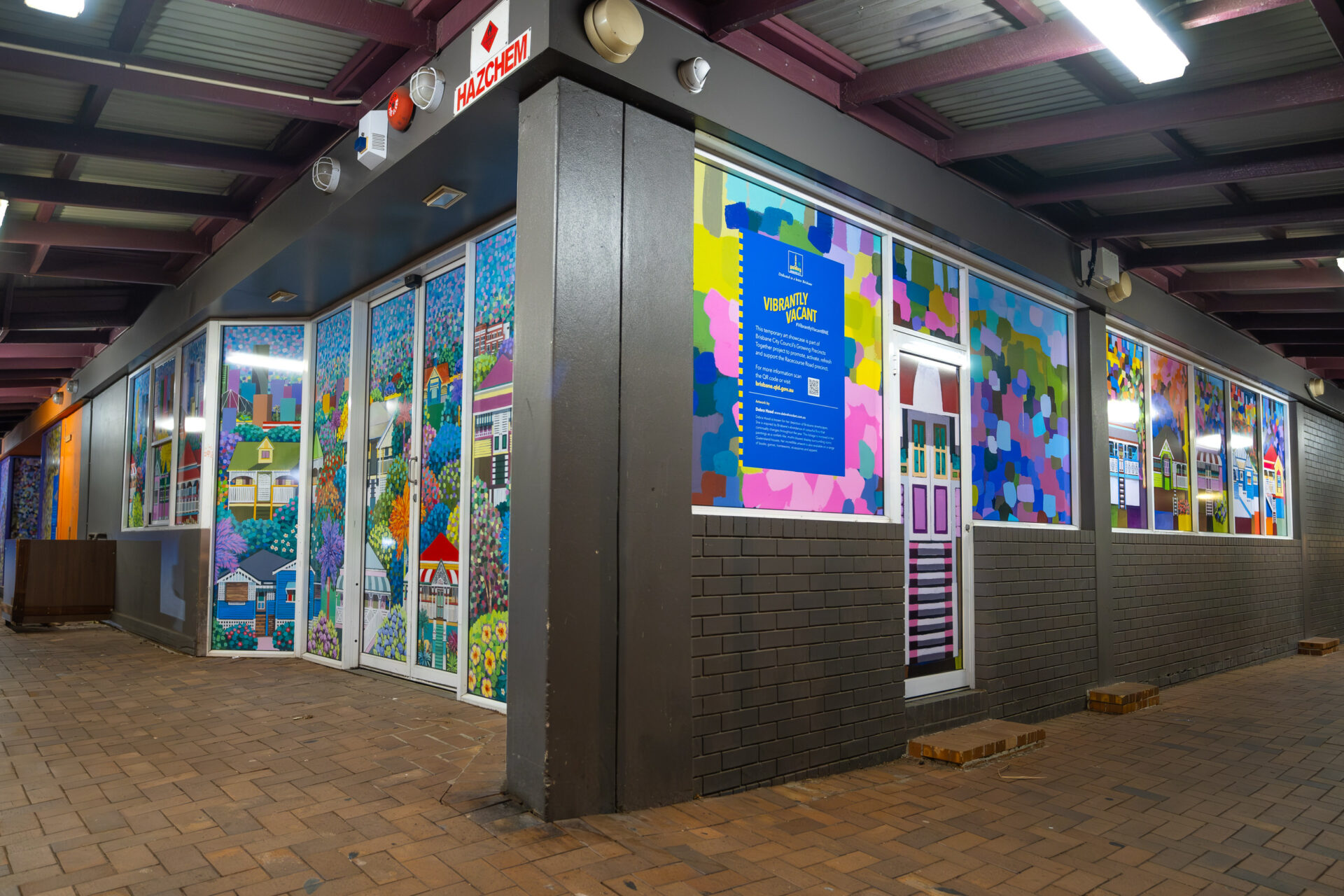 Corner of the Racecourse Road Shopfronts featuring Debra's Artwork